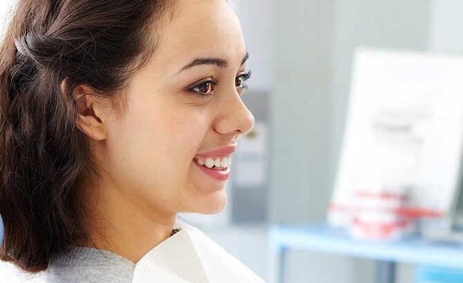 Smiling woman in a dental chair