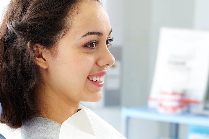 Smiling woman in a dental chair