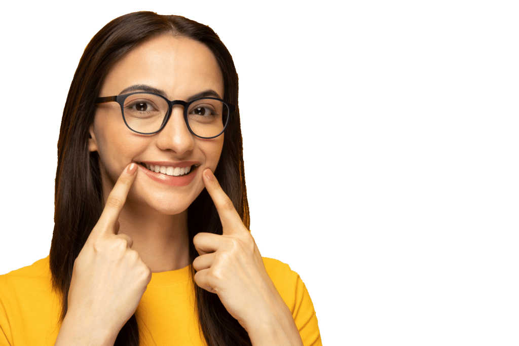 Girl pointing at her teeth